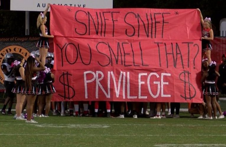 NC parents outraged over team’s ‘privileged’ banner at high school football game: ‘Racist’